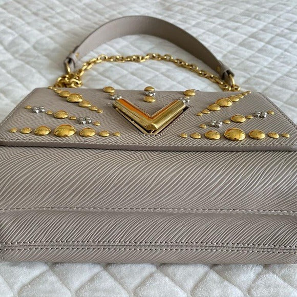 LV  TWISTER HANDBAG