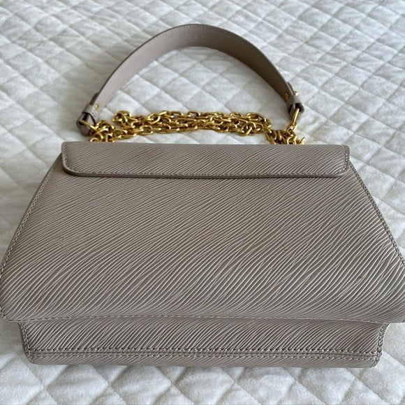 LV  TWISTER HANDBAG