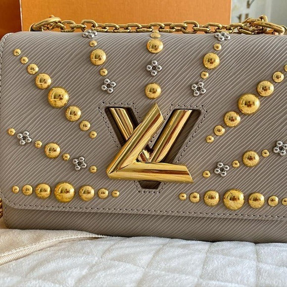 LV  TWISTER HANDBAG