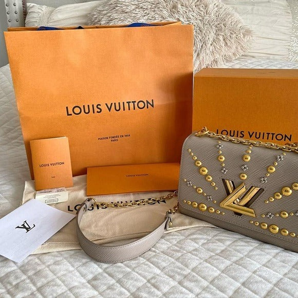 LV  TWISTER HANDBAG