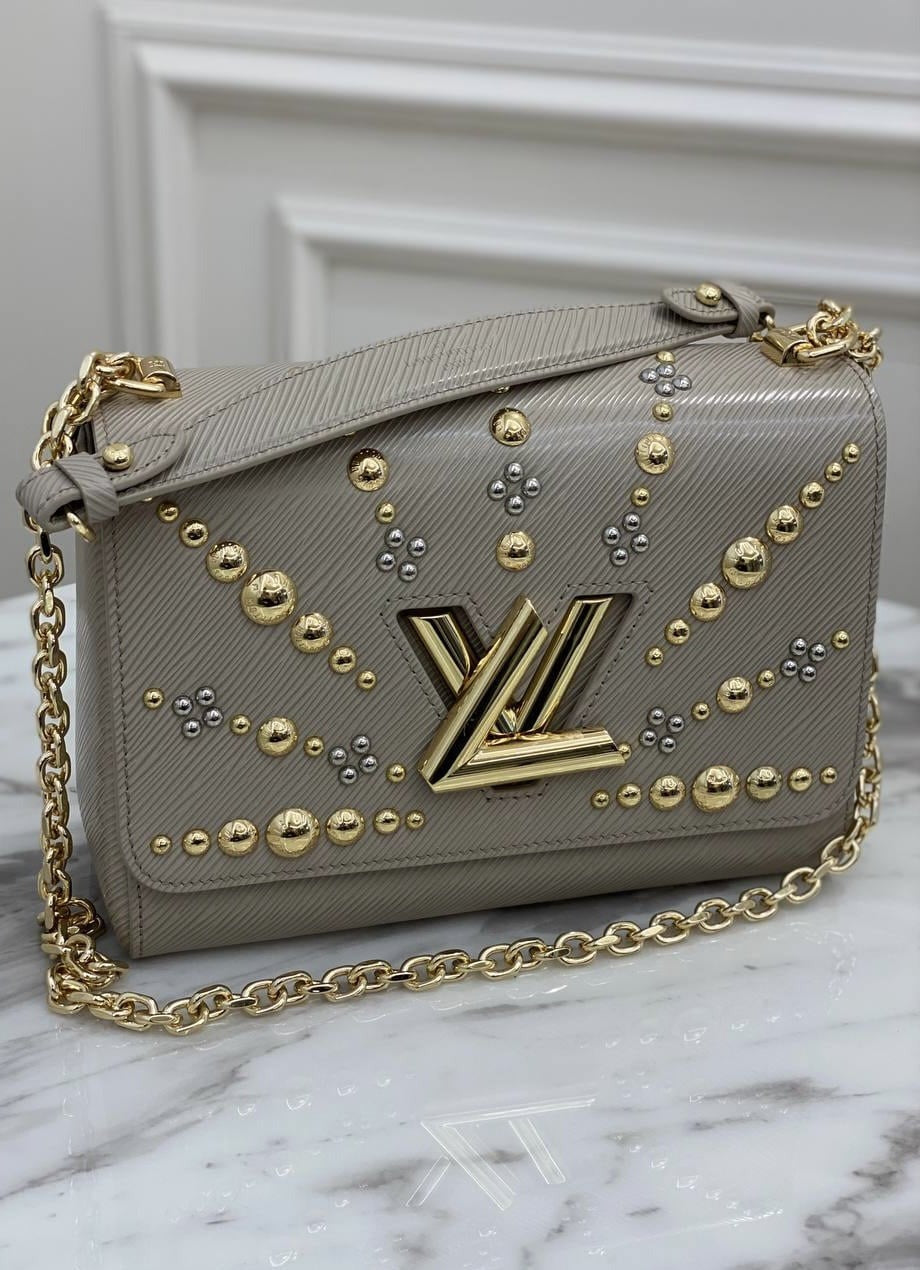 LV  TWISTER HANDBAG