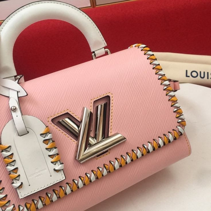 LV LOUIS VUITTON TWISTER HANDBAG