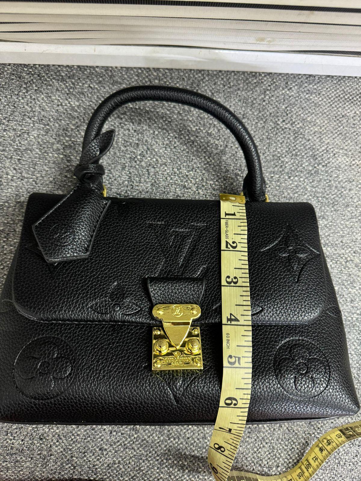 Louis Vuitton Madeleine MM Bag