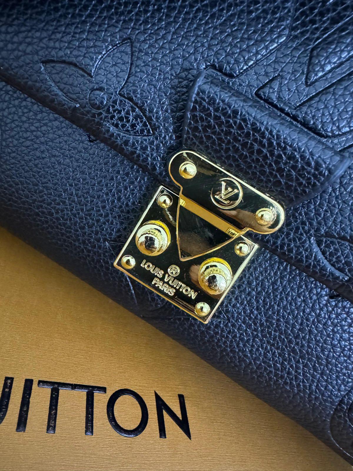 Louis Vuitton Madeleine MM Bag