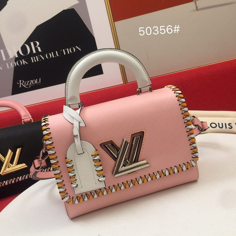 LV LOUIS VUITTON TWISTER HANDBAG