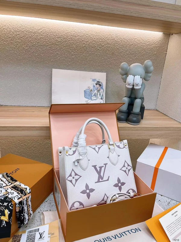 Louis Vuitton On The Go PM Bag